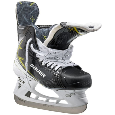 Bauer Ice Hockey Skates Bauer Vapor Velocity Source Exclusive (2025) Intermediate front side pointing right with tongue out